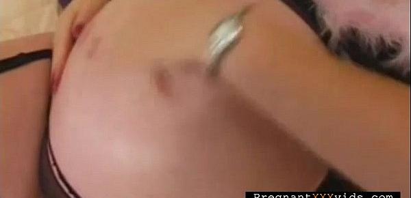  Mature pregnant plays with herself